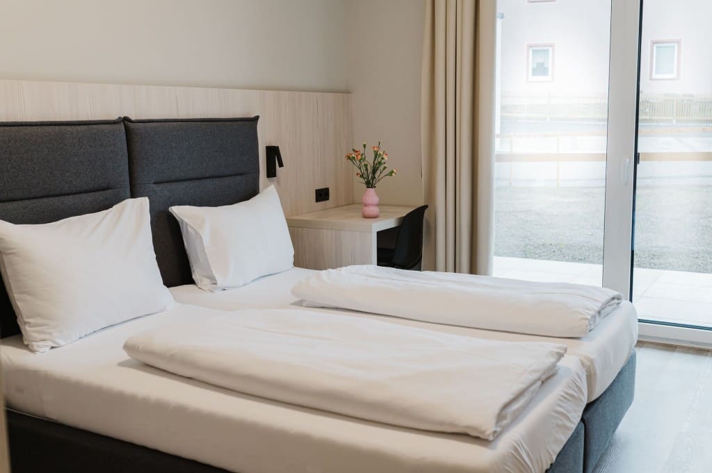 Schlafzimmer mit Balkon